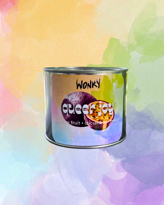 queer joy tin candle